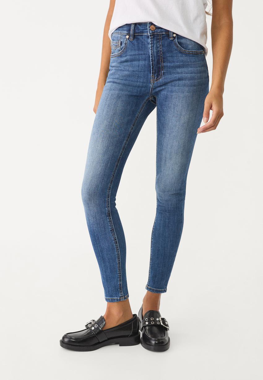 skinny jeans oprijete kavbojke stradivarius